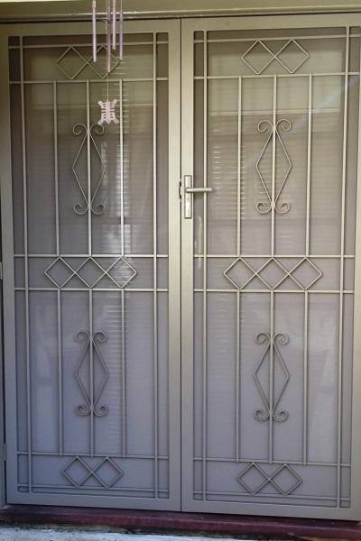 CB: 41 Clear Breeze Bright Steel Security Double Doors With Privacy Mesh In Jasper.