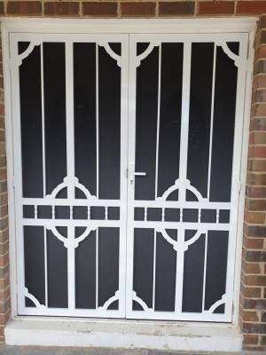 Cb: 65 Clear Breeze Steel Double Doors Daylesford 1/Sb With Hi Strength Privacy Black Mesh In White. CB: 65 Clear Breeze Steel Double Doors Daylesford 1/SB With Hi Strength Privacy Black Mesh In White.