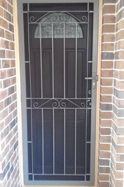 CB: 36 Clear Breeze Seaford Security Steel Door In Jasper With Stainless Steel Mesh