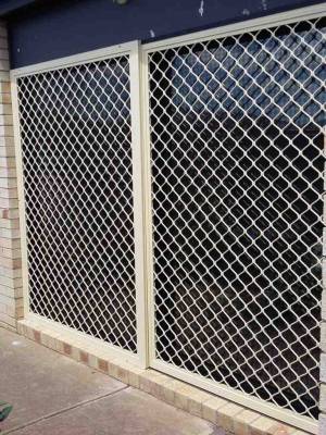 CB: 50 Sliding Screen Door Standard Diamond Grille in Primrose With Black Aluminium Tuff Screen Installed on The Outside Track & Fixed Side Panel.